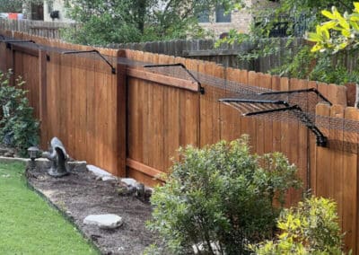 Purrfect Fence cat proof system on a timber fence